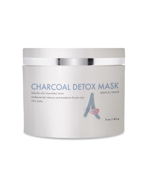 image of a small container with a white label saying charcoal detox mask
